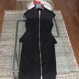 Black Fitted zip front dress.
